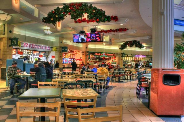 Mall food court with Christmas decorations.