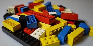 A pile of multi-colored Lego bricks.